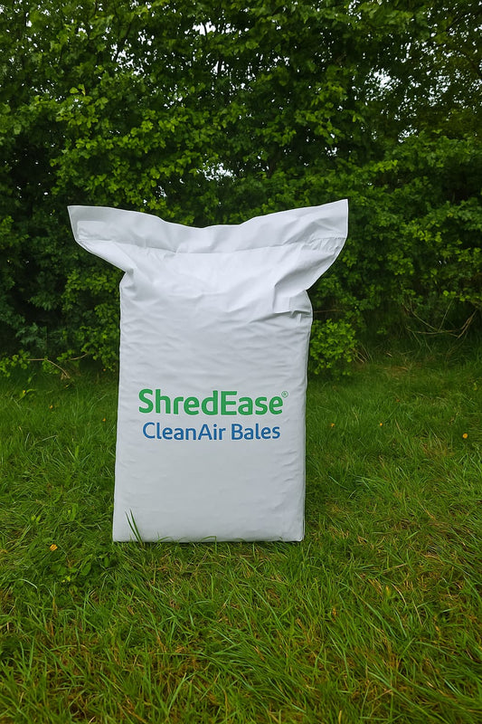 ShredEase CleanAir Bales – eco-friendly low-dust cardboard pet bedding on grass
